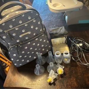 Bananafish backpack with medela pump.